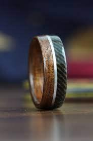 This Rustic Wedding Ring Is Made Of Wwi Wood With A Military Uniform Edge And Silver Inlay Choose Wood Wedding Ring Rustic Wedding Rings Wedding In The Woods