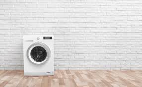 A laundry room (also called a utility room) is a room where clothes are washed and dried. Modern Washing Machine Near Brick Wall In Empty Laundry Room Space For Text Stock Photo Adobe Stock