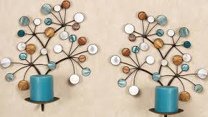 From installing simple iron candle wall decor to hanging up extravagant rembrandt paintings, the next step in adding class to your even when you find no need to use candles, these wall sconces provide a definitively classy touch to any room or corridor. 15 Timeless Wall Sconce Candle Holders Home Design Lover