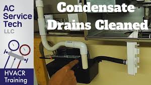 If you've ever taken a good look at your air conditioning unit, you may have noticed a small dripping line on the outside. Condensate Drain Traps Lines Cleaned On Ac And Gas Furnace Youtube