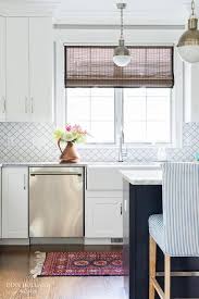 Gorgeous White And Blue Kitchen Is Fitted With A Red And Blue Kilim Runner Placed On Dark Stained Oak Floors I Kitchen Redo Kitchen Tiles White Tile Backsplash