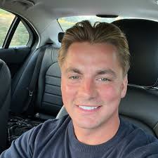 Can anyone provide a quote for trimming these laurels back so more light  gets in underneath? Thanks.