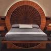 Wooden bed designs with intricate detailing are apt for rooms featuring traditional decor. 1