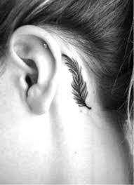Tiny tattoo enthusiasts, this one's for you. Eagle Feather Tattoo Behind Ear