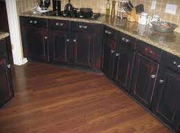 Pictures & ideas from hgtv | hgtv / cream cabinets, black distressed cabinets, weathered cabinets. Distressed Black Kitchen Cabinets Inspiration Home Interiors Kitchen Cabinet Inspiration Black Kitchen Cabinets Rustic Kitchen