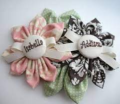 Each boutonniere contains one large flower, a filler flower and a piece of greenery. 5 Cute Diy Baby Shower Corsages To Make Shelterness