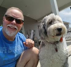 Happy birthday to a dog lover and Miami Dolphins fan