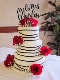 3 Tier Cake Buttercream Icing With Black Banding And Real Red Roses To Accent Serves 65 At Warfield S Cl Traditional Wedding Cakes Tiered Cakes Quince Cakes