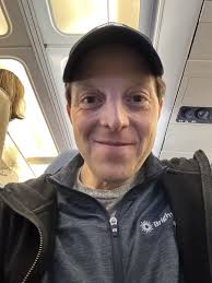 This is my proud face. Just boarded my ✈️ home from HR Tech in Vegas and a  woman boarding had a sweatshirt with the logo of one of our clients. I asked