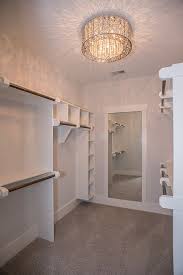 Directional lights are great for illuminating specific items in the closet. Master Bedroom Closet Lighting Ideas Novocom Top