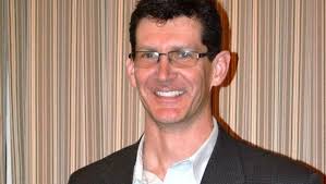 Eric Arnold receives 2014 Distinguished Service Award