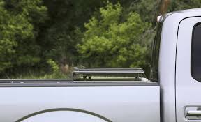 We have been a family owned and operated business located in tonneau covers provide an alternative to fiberglass covers for protecting your valuables and giving your truck that sleek, stylish look that is attractive and. Lomax Hard Tonneau Cover Folding Aluminum Matte Black Lomax Tonneau Covers Ab1010019