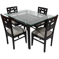 With curved edges to make dinnertime even more sociable, this is a great value set to create a real wow in your garden. Dark Brown Wooden Toughened Glass Top 4 Seater Dining Table Set Rs 11000 Set Id 21715220073