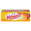 Place the cubes of velveeta into your slow cooker and cover the machine. 1