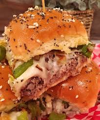 Dinner Rolls Are Stuffed With Tender Roast Beef Topped With Melted Provolone Cheese Saute Philly Cheese Steak Sliders Cheesesteak Sliders Philly Cheese Steak