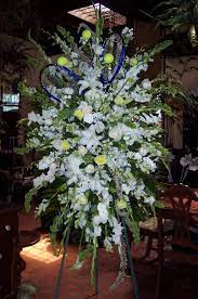 Celebration Of Life Standing Spray With Tennis Rackets 2 Days Delivery In Los Angeles Ca Darling S Flowers