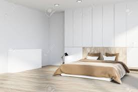 Medium shade hardwood is used in 42.18% of primary bedrooms that has hardwood. Corner Of Master Bedroom With White Walls Wooden Floor With Stock Photo Picture And Royalty Free Image Image 113596359