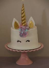 Fondant Edible Unicorn Cake Topper Gold Unicorn Etsy Unicorn Cake Unicorn Cake Topper Pumpkin Cake Assemble the cake by placing one round cake on the serving dish and spread a layer of plain buttercream frosting on top. pinterest
