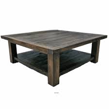 Modern low profile coffee table featuring a naturally grained wooden base and a stunning tempered glass tabletop. Wyoming Reclaimed Wood Square Coffee Table Log Cabin Rustics