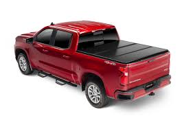 There is no reason your cargo should be damaged by harsh storms or errant debris. Rugged Cover E Series Hard Folding Truck Bed Cover Rugged Liner Rugged
