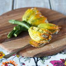 If you plan to make sauteed yellow squash, you can just spray a frying pan instead of a baking dish. Baked Stuffed Zucchini Flowers Recipe Chew Town Food Blog
