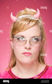 Portrait of a woman with traditional costume and face painting, Mount Hagen  Cultural Show, Papua New Guinea Stock Photo