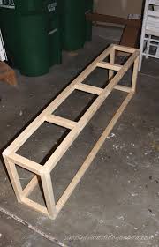 Apr 12, 2021 · you can build the frame out of wood, more or less the same way you would build a bench but careful to add backrest and armrest panels. Diy Simple End Of Bed Bench Simply Beautiful By Angela