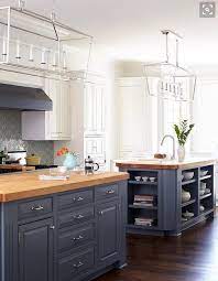 Blue wall creates an accent in the kitchen. Blue Kitchen Cabinets With Butcher Block Countertops Decorkeun