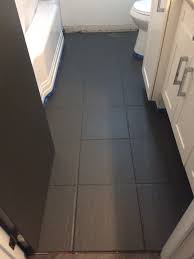 The all surface paint is available in 3 different colours: Bathroom Floor Painted Grey Flooring Dark Grey Tile Dark Grey Paint