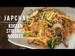 Flavorful And Exquisite Japchae Is Made Of Sweet Potato Noodles Julienne Vegetables And Sliced Beef Tossed In A Stir Fry Noodles Japchae Glass Noodles Recipe