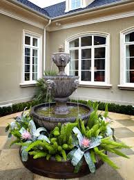 Outdoor Design Traditional Patio Splashing Fountain At Stone Basin Surrounded By Plants Decorative Water Fountains Outdoor Fountains Outdoor Garden Fountains