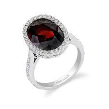 The Meanings Of Wearing Rings On Each Finger Pouted Com Garnet Engagement Ring How To Wear Rings Neil Lane Engagement Rings
