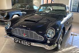 Image result for Midnight Blue 1964 Aston Martin