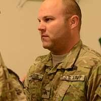 Master Sgt. Amanda Mercado, IAAFA Protocol, salutes