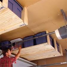 This contraption by delta uses a pulley system to efficiently lift and lower items. Easy Garage Storage Solutions Diy Family Handyman