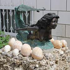 An artfully detailed mermaid wall statue for your exotic decor. Bronze Mermaid Sculptures Bronze Mermaid Statues Bronze Mermaid Figurines