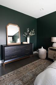 I think a bit more white could used, but the effect is great. Contemporary Condo In Chicago The Diy Playbook Green Bedroom Walls Green Master Bedroom Bedroom Interior