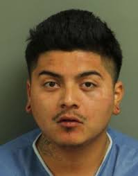 Raleigh man accused of headbutting EMS worker in the throat at crash scene