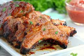 Then add the seasoning to the ribs, rub it in, and then add the bbq sauce. Tender Ribs In Air Fryer The Typical Mom