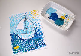 Next, we did a sink or float activity. How To Make A Paint Resist Toy Boat Art Project