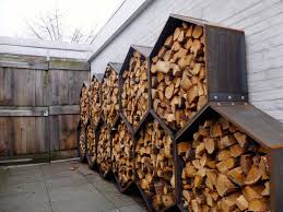 We used to keep our firewood in the basement, but this year we got two full cords of wood at once, and there was literally no room to store it all inside. Octagon Outdoor Firewood Storage Outdoor Firewood Rack Diy Outdoor Backyard