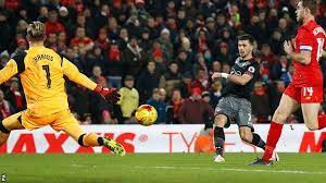 He watches it all the way and volleys it into the net from close range but he's miles off. Liverpool 0 1 Southampton Agg 0 2 Bbc Sport