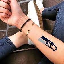 That tattoo ended up being prophetic as the seahawks crushed the broncos to win their first super bowl. Seahawks Eagles Temporary Tattoo Sticker Ohmytat