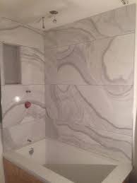 Beautiful Large Format Tile Bathtub Surround Bathrooms Remodel Bathroom Remodel Designs Large Format Tile