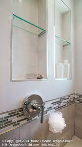 The slotted soap rack provides water drainage. Tempered Glass Shelf Schluter Tile Edging Chrome Shower Hooks Shower Niche Glass Shelves In Bathroom Glass Shelves Decor