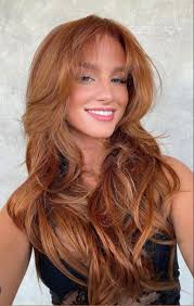 Would anyone be interested in trying to color correct the orange hair?