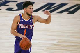 Devin booker is a professional american basketball player who plays for the 'national basketball association' (nba) team 'phoenix suns.' he was born to famous basketball player melvin booker. Devin Booker And Suns Are Wildest Things About West Race Los Angeles Times