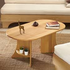 table basse ovale table en bois blond en hetre massif forme ovale et pietements arrondis composent une elegante table basse table de salon