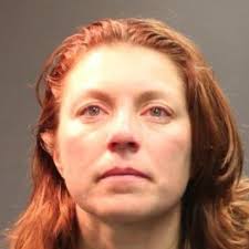 Woman arms herself with field hockey stick when Sports Authority employees  refuse to let her leave