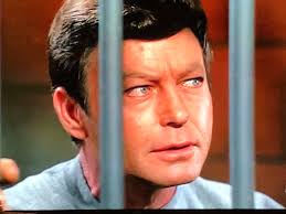 Well, I had to see it to believe it. Explain. They're about to lop off the  Captain's professional head and you're sitting here playing chess with a  computer. That is true. Mister